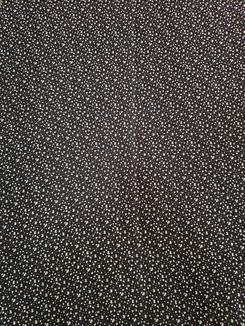 Tiny White Flowers On Black Cotton Spandex Fabric - Black With Tiny White Flowers, 58"-60" Width