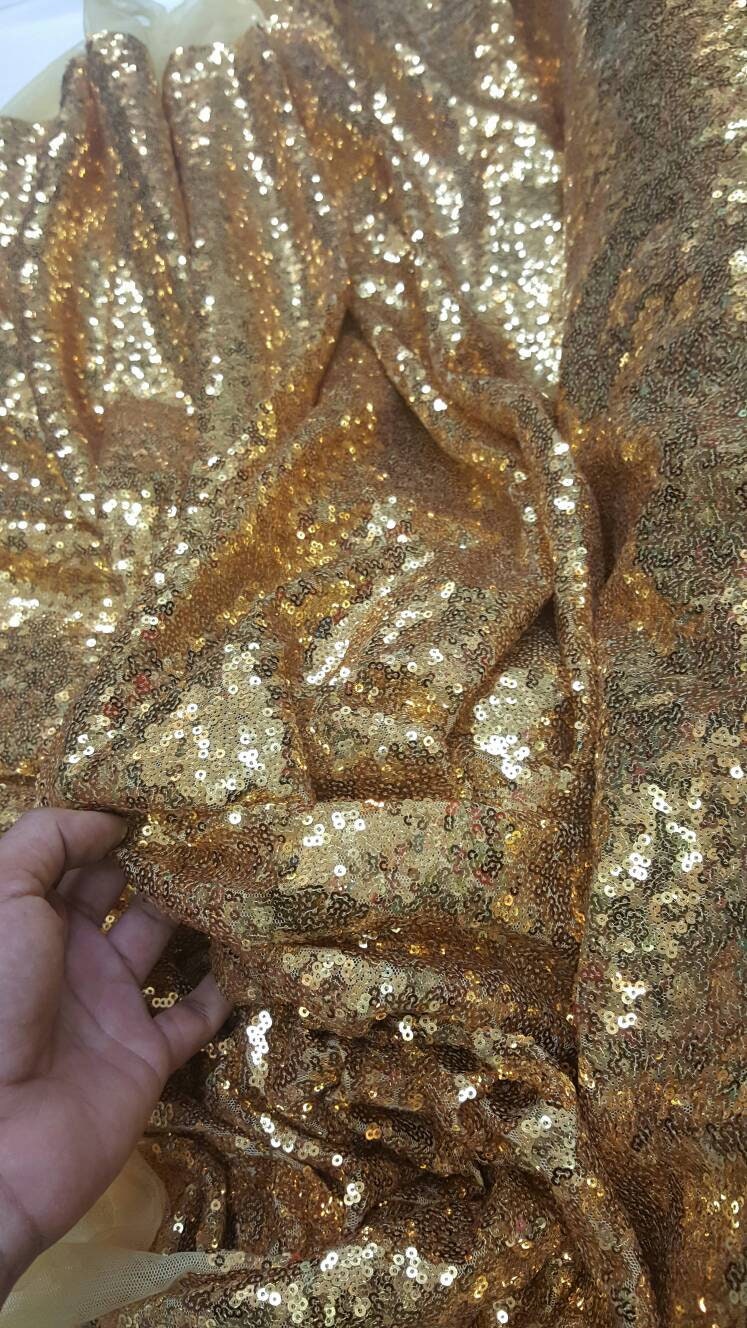 Sequin Fabric on Yellow Mesh Gold
