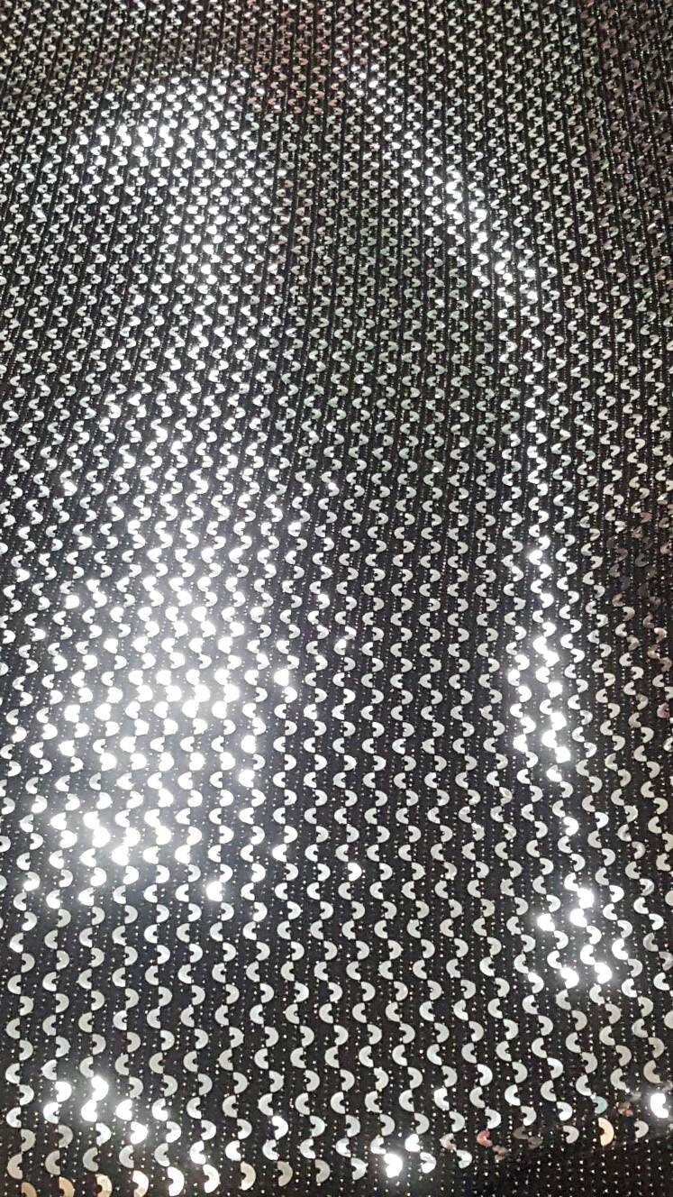 Silver Sequin Stretch Fabric on Black