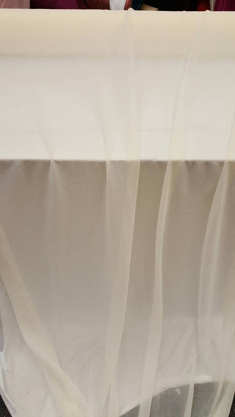 Ivory Stretch Lame Fabric