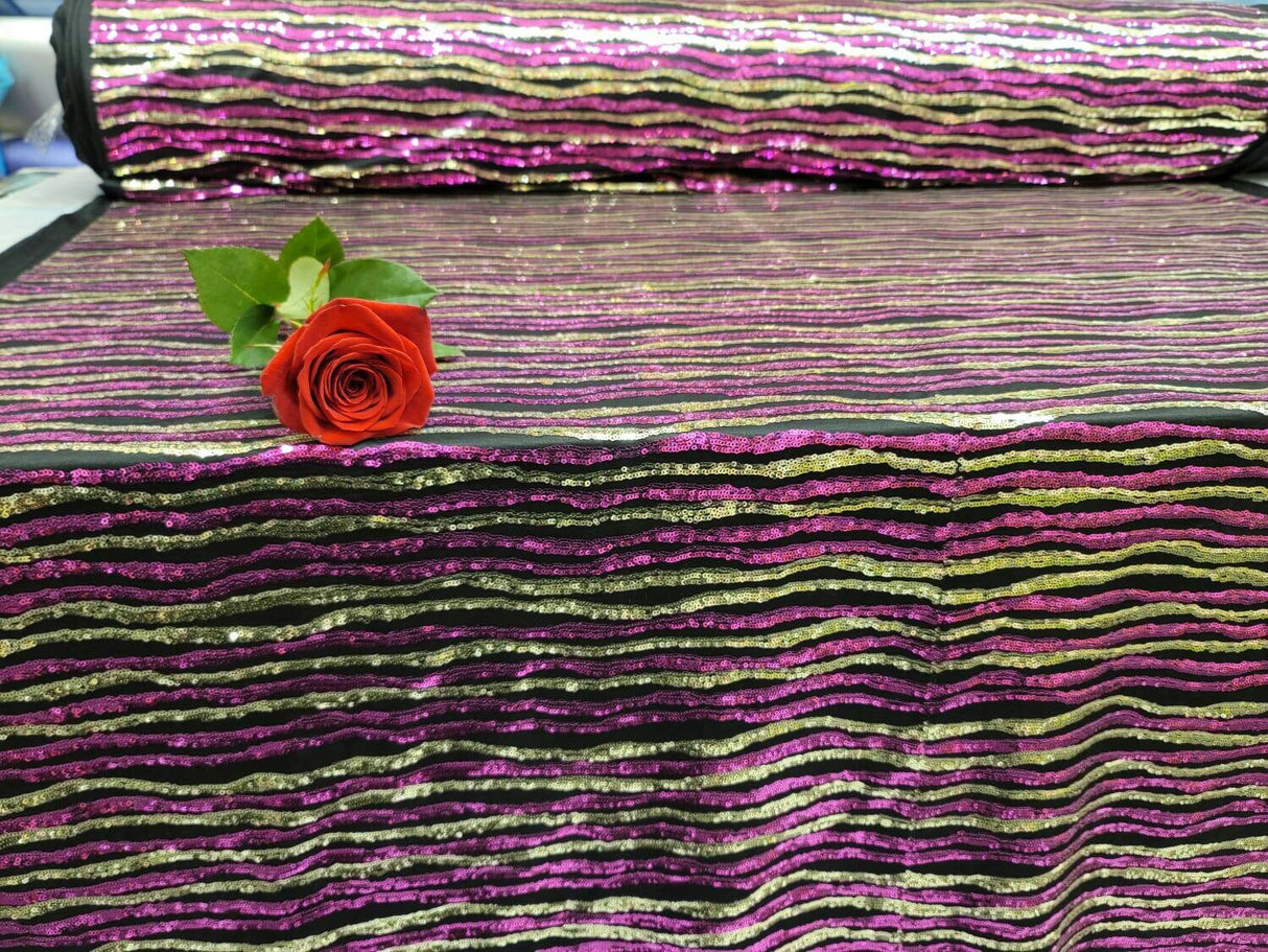 Sequin Fabric on Black Jersey Knit Gold and Fuchsia