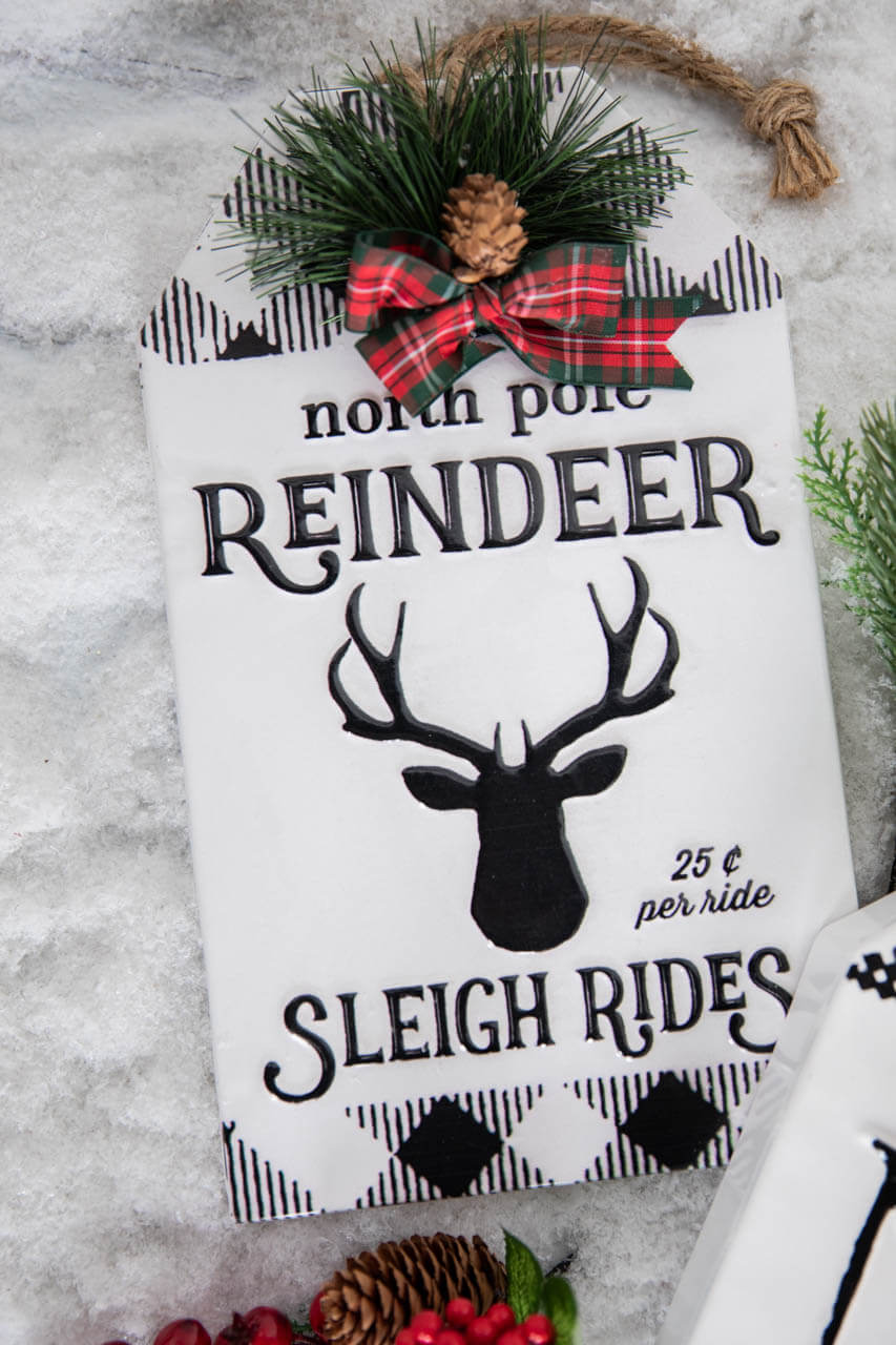 12” Metal Embossed Holiday Wall Sign with Floral Accent