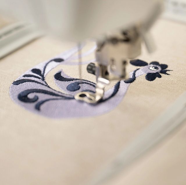 Husqvarna Viking Designer Quartz 29 Sewing Embroidery Machine - 250 Stitches, 180 Embroidery Designs, 7" Color Touch Screen (1 Unit)