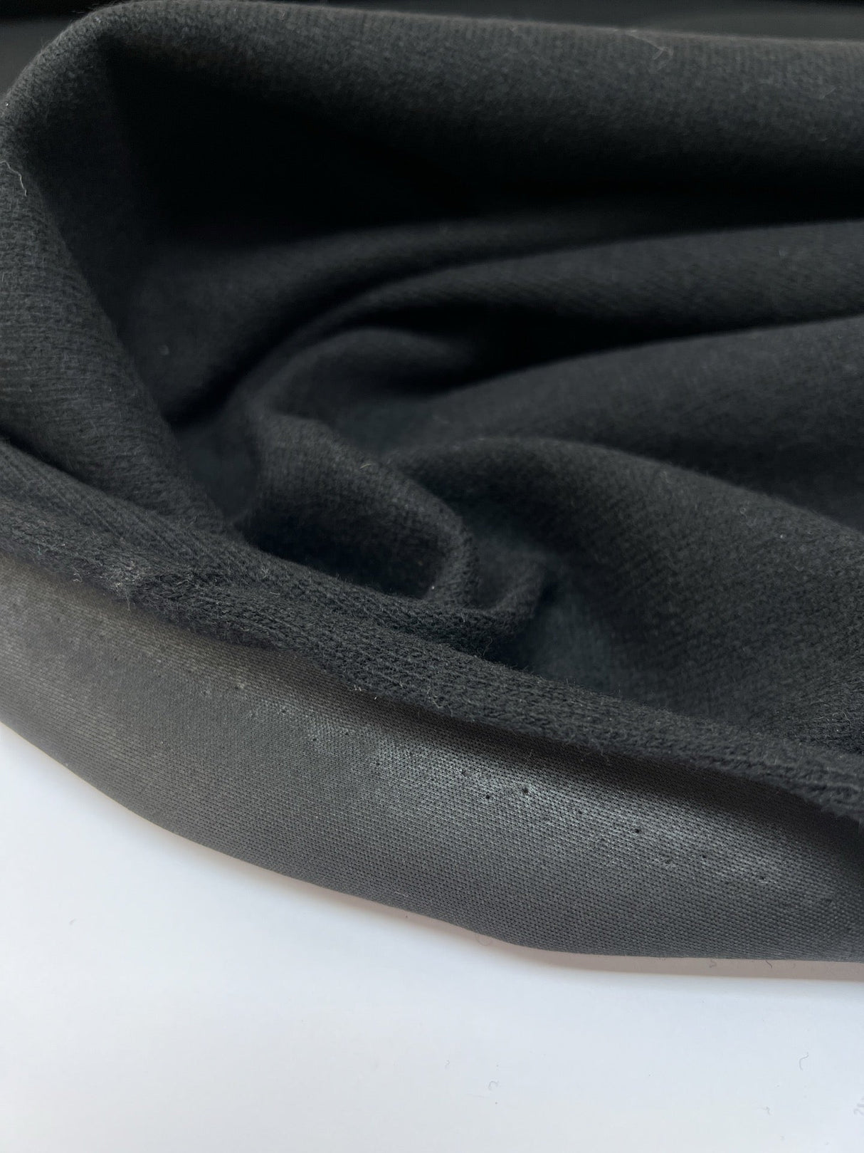 Black Wool Fused Knitted Fabric