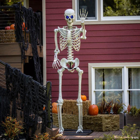 Posable Titan Skeleton Halloween Decoration with Color-Changing Eyes, showing a detailed skeletal bone design