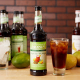 Monin 750 mL Mango Tea 7:1 Concentrate