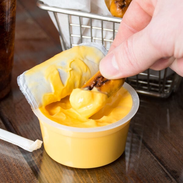 Muy Fresco 3.8 oz. Microwavable Cheddar Cheese Sauce Cup - 30/Case