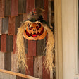 11 3/4" x 27 1/2" Hanging Pumpkin Head Plastic Halloween Decoration