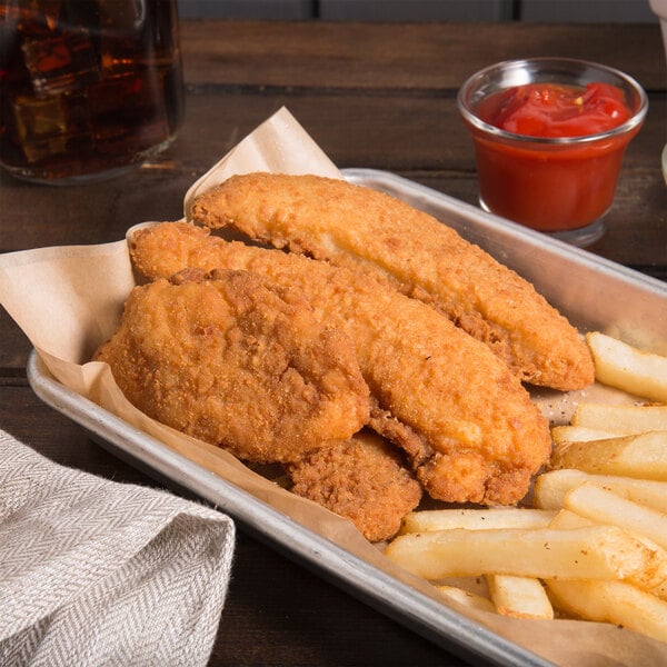 Tyson 5 lb. Bag of Uncooked Breaded Chicken Tenderloins - 2/Case