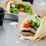 Kronos 0.5 oz. Fully Cooked Traditional Gyros Slices 5 lb. Pack - 4/Case