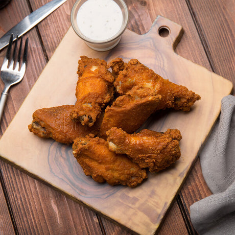 Tyson Fire Stingers Magnum Fully Cooked Breaded Chicken Wings 7.5 lb. - 2/Case