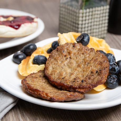Hatfield Chef Signature 1.5 oz. Fully Cooked Pork Sausage Patty - 10 lb.