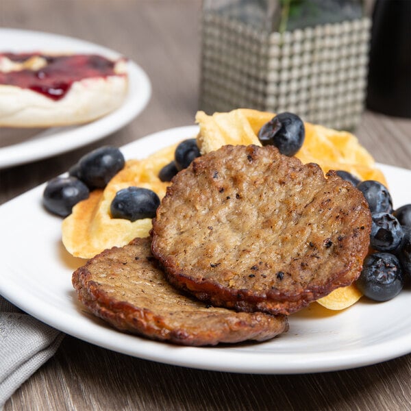 Hatfield Chef Signature 1.5 oz. Fully Cooked Pork Sausage Patty - 10 lb.