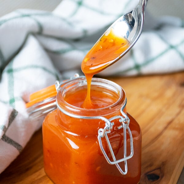 Sweet Baby Ray's 0.5 Gallon Mango Habanero Wing Sauce and Glaze - 4/Case