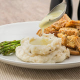 Trio 22.6 oz. Chicken Gravy Mix - 8/Case