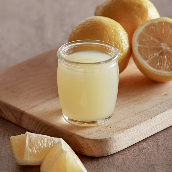 Sunkist 30 fl. oz. 100% Frozen Lemon Juice - 12/Case