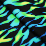 Eye Of The Tiger Nylon Spandex Fabric - Blue/Green Or Pink/Orange Tiger Print On Black, 58/60" Width (1 Yard)