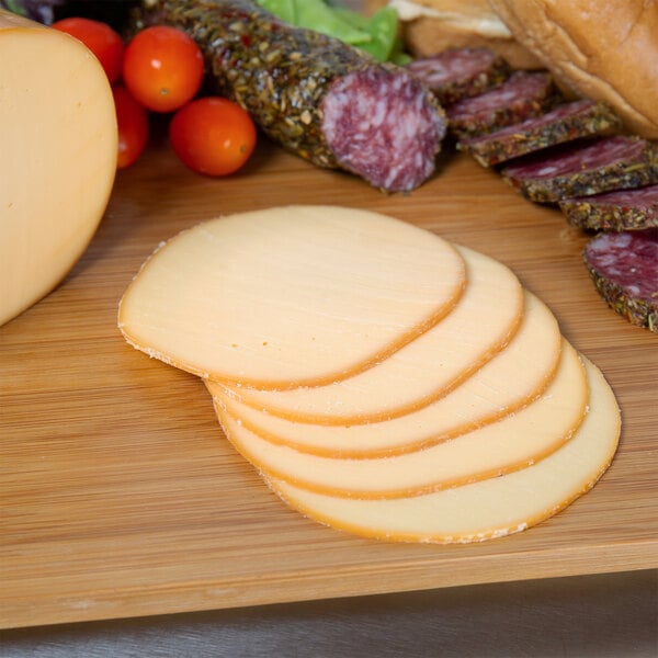 Traditional Delights Hickory Smoked Gouda Cheese 6 lb. Roll - 4/Case