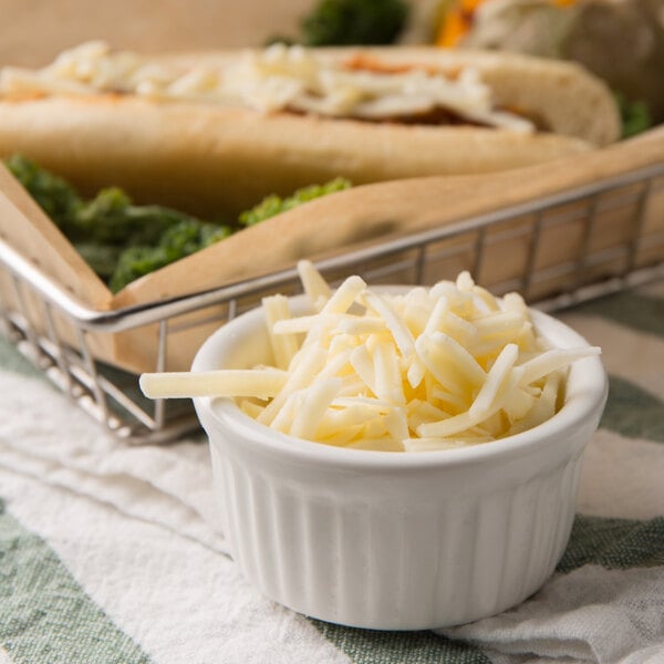 Great Lakes Cheese 5 lb. Bag Shredded Mild White Natural Cheddar Cheese - 4/Case