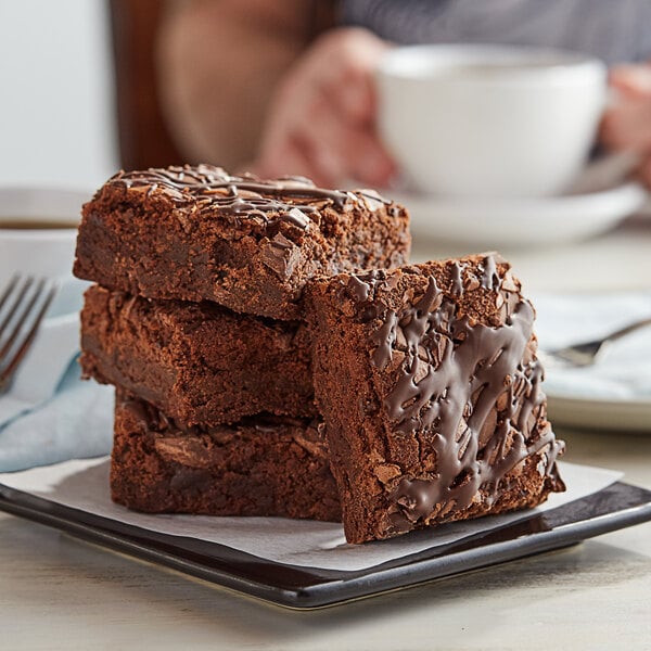 David's Cookies 4 oz. Pre-Cut Double Fudge Chunk Brownie 24-Count Tray - 2/Case
