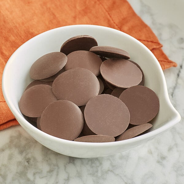 Guittard 25 lb. Soleil d'Or 38% Milk Chocolate Wafers