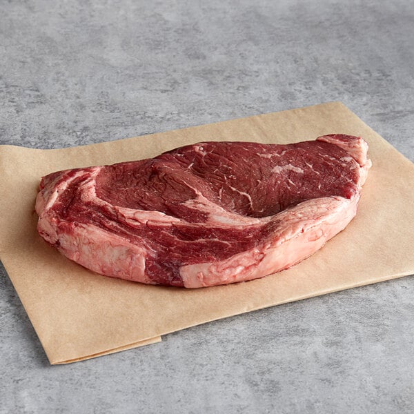 Warrington Farm Meats 12 oz. Frozen Delmonico Steak - 14/Case