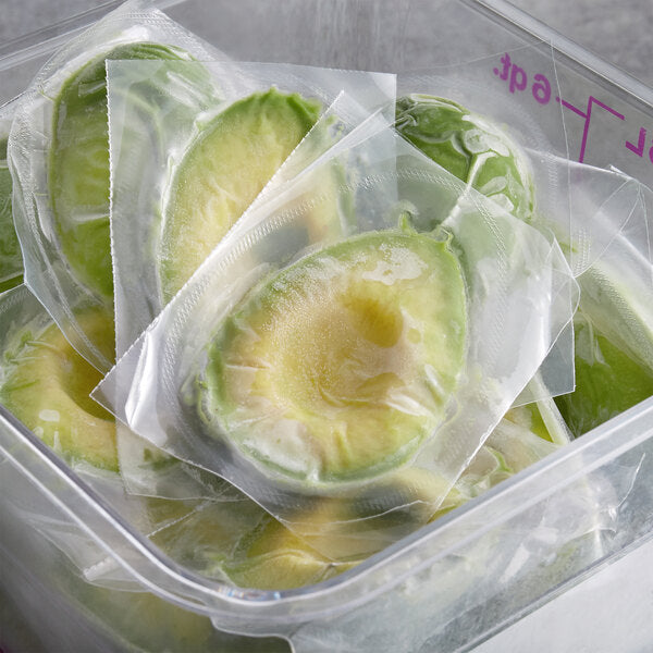Wholly Guacamole IQF Individually Wrapped Hass Avocado Halves 1.5 oz. - 64/Case