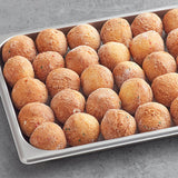 Rich's 1.31 oz. Ready-to-Finish Jumbo Birthday Cake Filled Donut Bite - 220/Case