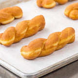 Rich's 2.75 oz. Ready-to-Finish Twisted Yeast Donut - 48/Case
