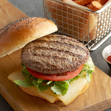 Warrington Farm Meats 4 oz. Frozen Ground Chuck, Short Rib, and Brisket Blend Burger Patty - 40/Case