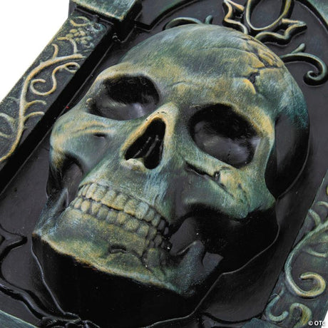 RADYAN Halloween Tombstone with 3D Grinning Skull and Swirled Design shown in a clear product image