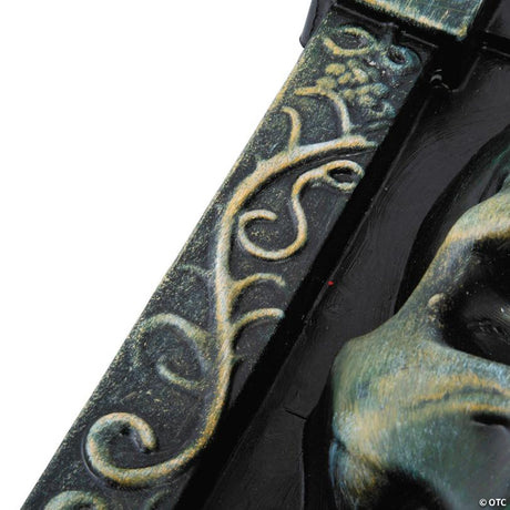 RADYAN Halloween Tombstone with 3D Grinning Skull and Swirled Design shown in a clear product image