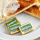Grassland 7.7 Gram Salted Grade AA Foiled Butter Chips - 1,000/Case