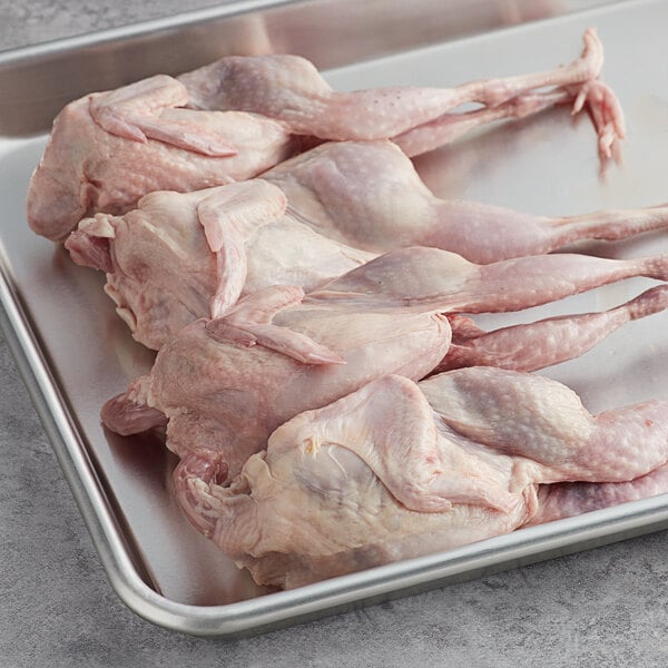 Manchester Farms 4-5 oz. Fresh Whole Quail with Feet - 24/Case