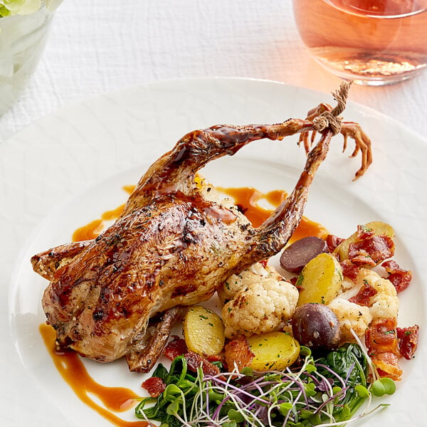 Manchester Farms 4-5 oz. Fresh Whole Quail with Feet - 24/Case