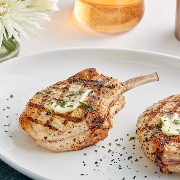 Rastelli's 14 oz. Premium Bone-In Cowboy Pork Steak - 12/Case
