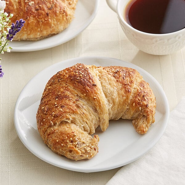Bridor Ready-to-Bake Curved Multigrain Croissant 3.53 oz. - 54/Case