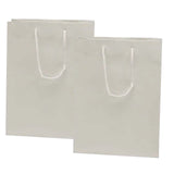 Sophistication in Every Bag 6 1/4'' x 3 1/2'' x 8 1/2''