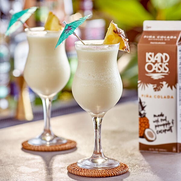 Island Oasis Pina Colada Frozen Beverage Mix 32 fl. oz. - 12/Case