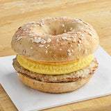 Grand Prairie Sausage, Egg, and Cheese Bagel Sandwich 5 oz. - 24/Case