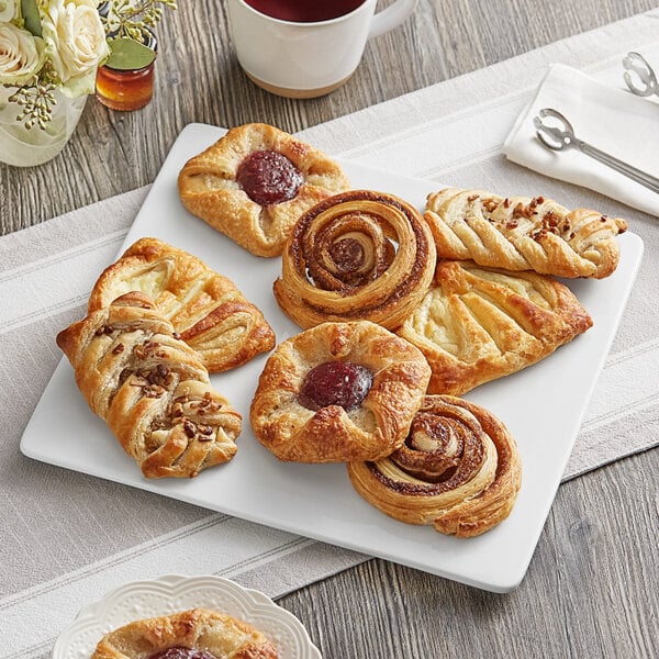 Schulstad Ready-to-Bake Large Assorted Danish 12 Count of 4 Flavors - 48/Case