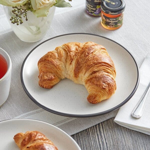 Schulstad Ready-to-Bake Large Curved Butter Croissant 3.2 oz. - 54/Case