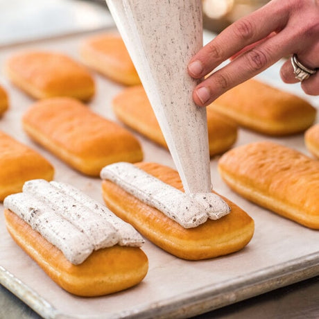 Rich's 2.25 oz. Ready-to-Finish Unfilled Long John Yeast Donut - 60/Case