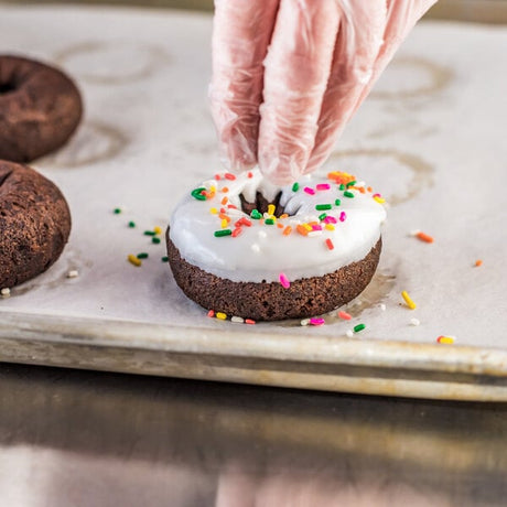 Rich's 3 oz. Ready-to-Finish Jumbo Chocolate Cake Donut - 100/Case