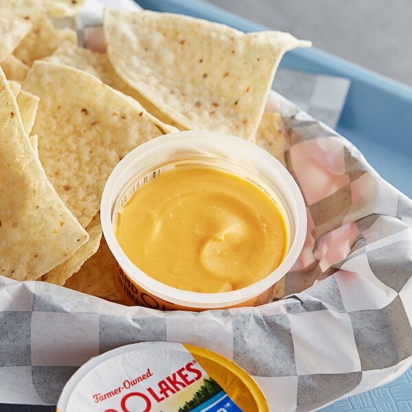 Land O Lakes Ultimate Cheddar Cheese Dip 3 oz. Cup - 140/Case