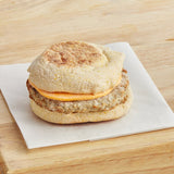 Grand Prairie Sausage and Cheddar Whole Wheat Muffin Sandwich 4 oz. - 24/Case