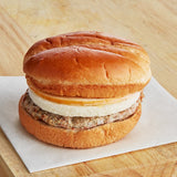 Grand Prairie Smoky Bistro Chicken Sausage and Egg Brioche Sandwich 5.7 oz. - 16/Case