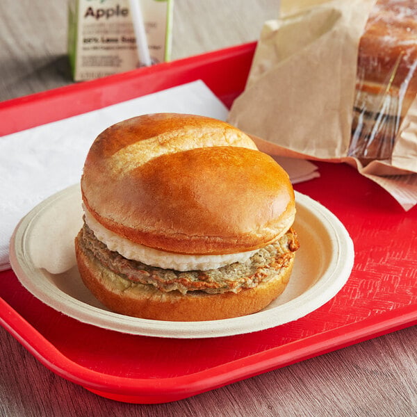 Grand Prairie Smoky Bistro Chicken Sausage and Egg Brioche Sandwich 5.7 oz. - 16/Case