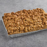 Hahn's Bakery 20-Slice Pre-Cut Caramel Apple German Crumb Cake 1/2 Sheet 11 lb. - 2/Case