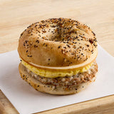 Grand Prairie Spicy Sausage, Egg, and Gouda Everything Bagel Sandwich 5.2 oz. - 24/Case